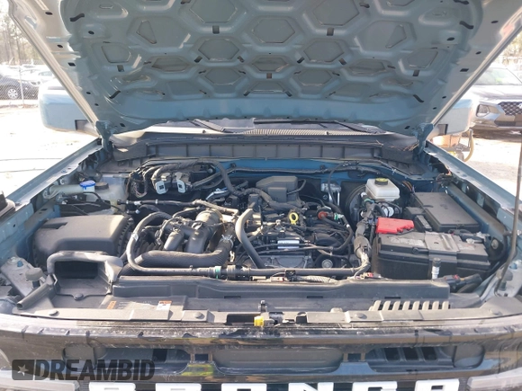 2022 Ford Bronco z VIN 1FMDE5DH0NLB77892, wystawiony jako IAAI lot #41466172 z przebiegiem 38 709 mil mil oraz . Historia ofert i sprzedaży dostępna na DreamBid. Obrazek 10.