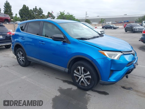 2018 Toyota RAV4 LE with VIN 2T3BFREV6JW740214, listed as a IAAI auction lot 42106349 with 105,831 mi miles and . Bid and sale history available at carsss.com. Image 1.