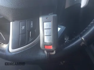 2015 Mitsubishi Outlander Sport 2.4 GT with VIN 4A4AR4AW2FE032859, listed as a IAAI auction lot 41688091 with 200,394 mi miles. Bid and sale history available at carsss.com. Image 11.