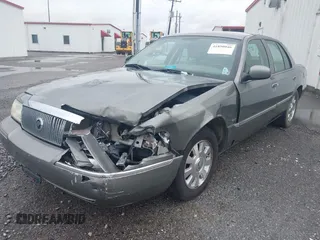 2004 Mercury Grand Marquis LS Premium z VIN 2MEHM75W64X654827, wystawiony jako IAAI lot #41890046 z przebiegiem Nie podano mil oraz . Historia ofert i sprzedaży dostępna na DreamBid. Obrazek 2.