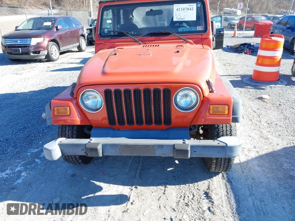 2006 Jeep Wrangler SE with VIN 1J4FA29S16P712101, listed as a IAAI auction lot 41347042 with 129,063 mi miles. Bid and sale history available at carsss.com. Image 6.