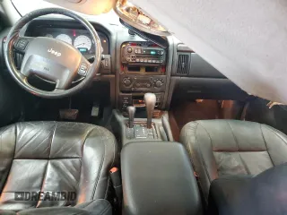 2002 Jeep Grand Cherokee Limited z VIN 1J8GW58S02C279251, wystawiony jako Copart lot #61563465 z przebiegiem 182 244 mil mil oraz Szkoda całkowita • Salvage title. Historia ofert i sprzedaży dostępna na DreamBid. Obrazek 8.