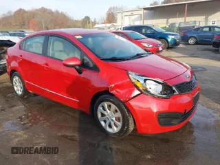 2015 Kia Rio LX with VIN KNADM4A30F6443225, listed as a IAAI auction lot 40705431 with 141,698 mi miles. Bid and sale history available at carsss.com. Image 1.