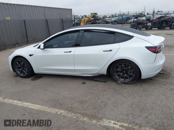 2023 Tesla Model 3 with VIN 5YJ3E1EA5PF505856, listed as a IAAI auction lot 41885837 with 28,206 mi miles and . Bid and sale history available at carsss.com. Image 13.