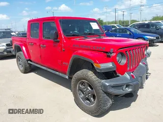2023 Jeep Gladiator Rubicon z VIN 1C6JJTBG2PL509200, wystawiony jako IAAI lot #42537312 z przebiegiem Nie podano mil oraz . Historia ofert i sprzedaży dostępna na DreamBid. Obrazek 1.