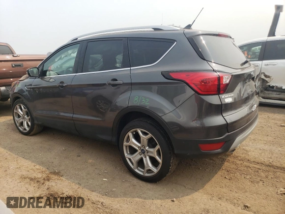 2019 Ford Escape Titanium with VIN 1FMCU9J98KUA56391, listed as a Copart auction lot 59215935 with 27,056 mi miles and Salvage title. Bid and sale history available at DreamBid. Image 2.