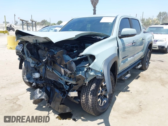 2022 Toyota Tacoma SR with VIN 3TYCZ5AN0NT104300, listed as a IAAI auction lot 42652503 with 18,071 mi miles and . Bid and sale history available at DreamBid. Image 18.