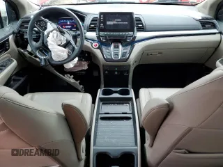 2023 Honda Odyssey Touring с VIN 5FNRL6H8XPB056468, выставлен на аукционе Copart как лот 55066345 с пробегом 29 760 миль миль и Списание • Salvage title. История ставок и продаж доступна на DreamBid. Изображение 8.