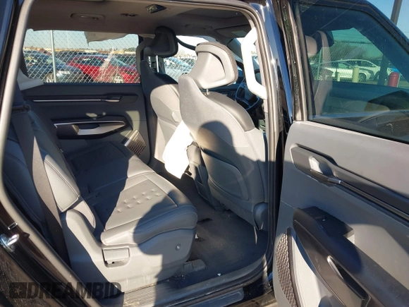 2024 Kia EV9 Wind z VIN KNDAFFS58R6022482, wystawiony jako IAAI lot #41688945 z przebiegiem 8 907 mil mil oraz . Historia ofert i sprzedaży dostępna na DreamBid. Obrazek 8.