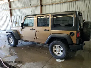 2015 Jeep Wrangler Unlimited Freedom with VIN 1C4BJWDG5FL713046, listed as a Copart auction lot 58563455 with 144,179 mi miles and Salvage title. Bid and sale history available at DreamBid. Image 2.