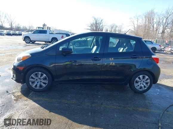 2012 Toyota Yaris L with VIN JTDKTUD31CD500337, listed as a IAAI auction lot 41410723 with 130,881 mi miles. Bid and sale history available at carsss.com. Image 14.