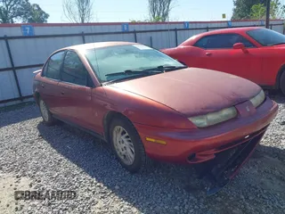1998 Saturn SL z VIN 1G8ZK5270WZ223002, wystawiony jako IAAI lot #41959507 z przebiegiem Nie podano mil oraz . Historia ofert i sprzedaży dostępna na DreamBid. Obrazek 1.