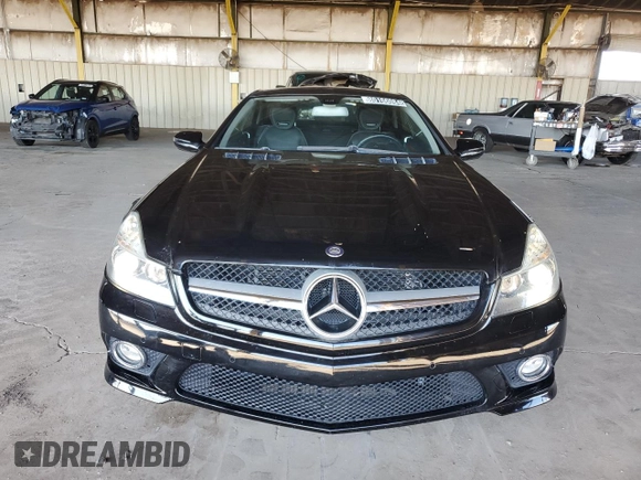 2011 Mercedes-Benz SL 550 z VIN WDBSK7BAXBF165859, wystawiony jako Copart lot #80166084 z przebiegiem 33 119 mil mil oraz Czysty tytuł • Clean title. Historia ofert i sprzedaży dostępna na DreamBid. Obrazek 5.
