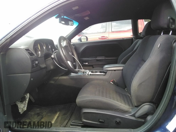 2013 Dodge Challenger SXT z VIN 2C3CDYAG3DH578949, wystawiony jako Copart lot #54664815 z przebiegiem 205 376 mil mil oraz Szkody całkowita. Historia ofert i sprzedaży dostępna na DreamBid. Obrazek 7.