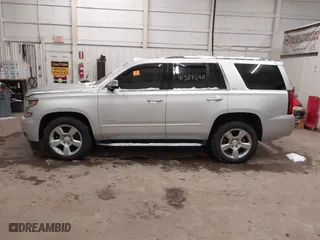 2016 Chevrolet Tahoe LTZ with VIN 1GNSKCKCXGR284827, listed as a IAAI auction lot 41389540 with 93,150 mi miles. Bid and sale history available at carsss.com. Image 14.