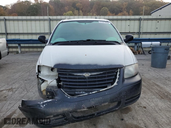 2007 Chrysler Town & Country with VIN 1A8GJ45R07B221793, listed as a Copart auction lot 77323894 with 221,573 mi miles and Salvage Title. Bid and sale history available at DreamBid. Image 5.