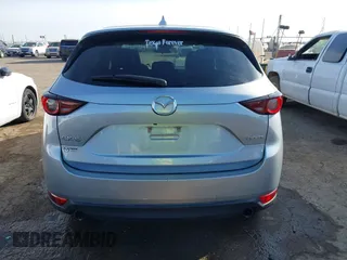 2020 Mazda CX-5 Touring with VIN JM3KFACM1L0789394, listed as a IAAI auction lot 41565887 with 73,730 mi miles. Bid and sale history available at carsss.com. Image 17.