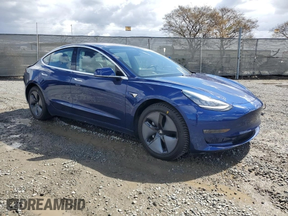 2019 Tesla Model 3 Mid Range with VIN 5YJ3E1EA8KF299456, listed as a Copart auction lot 48152695 with 27,144 mi miles and Salvage Title. Bid and sale history available at DreamBid. Image 4.