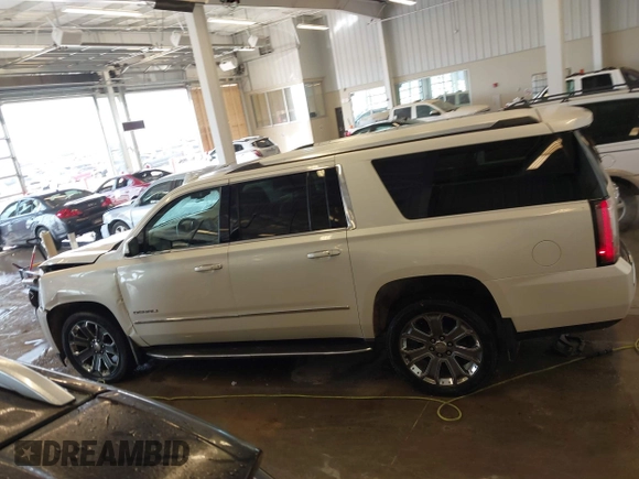 2015 GMC Yukon XL Denali with VIN 1GKS2JKJXFR528927, listed as a IAAI auction lot 41391259 with 159,467 mi miles. Bid and sale history available at carsss.com. Image 14.