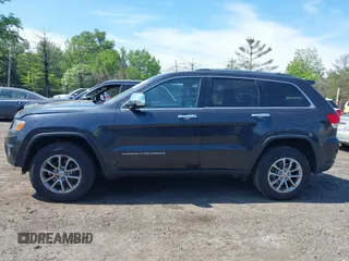 2014 Jeep Grand Cherokee Limited z VIN 1C4RJFBG3EC570064, wystawiony jako IAAI lot #42246935 z przebiegiem 120 766 mil mil oraz . Historia ofert i sprzedaży dostępna na DreamBid. Obrazek 14.