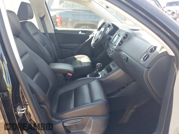 2017 Volkswagen Tiguan S with VIN WVGBV7AX9HK039244, listed as a IAAI auction lot 42050325 with 70,828 mi miles and . Bid and sale history available at DreamBid. Image 5.