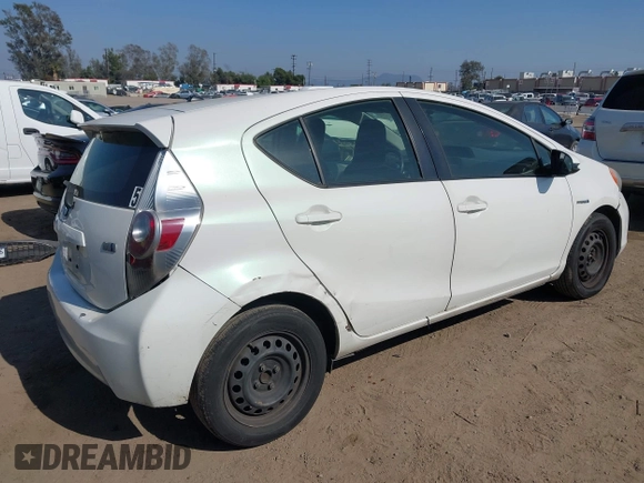 2014 Toyota Prius One with VIN JTDKDTB35E1082542, listed as a IAAI auction lot 42159682 with 166,231 mi miles and . Bid and sale history available at DreamBid. Image 4.