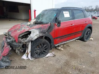 2015 MINI Cooper Countryman S with VIN WMWZC5C58FWP46721, listed as a IAAI auction lot 41889681 with 1 mi miles. Bid and sale history available at carsss.com. Image 2.