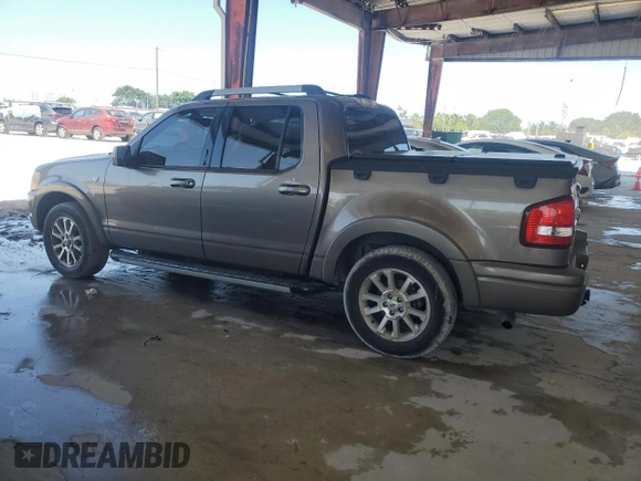 2007 Ford Explorer Sport Trac Limited z VIN 1FMEU338X7UA23698, wystawiony jako Copart lot #54888695 z przebiegiem 167 996 mil mil oraz Czysty tytuł • Clean title. Historia ofert i sprzedaży dostępna na DreamBid. Obrazek 2.