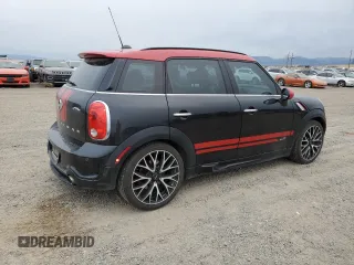 2016 MINI Countryman John Cooper Works with VIN WMWXD1C53GWS95325, listed as a Copart auction lot 77540424 with 98,951 mi miles and Salvage Title. Bid and sale history available at DreamBid. Image 3.
