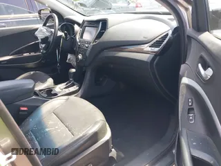 2017 Hyundai Santa Fe Ultimate z VIN 5NMZW4LA7HH047989, wystawiony jako IAAI lot #42051500 z przebiegiem 75 747 mil mil oraz . Historia ofert i sprzedaży dostępna na DreamBid. Obrazek 5.