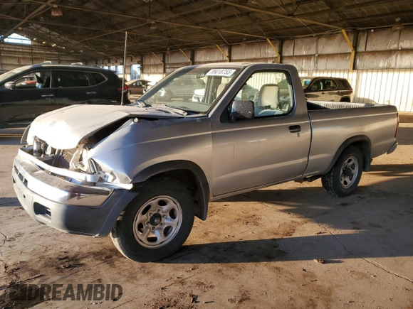 2000 Nissan Frontier XE z VIN 1N6DD21S5YC340513, wystawiony jako Copart lot #89018755 z przebiegiem 237 418 mil mil oraz Szkoda całkowita • Salvage title. Historia ofert i sprzedaży dostępna na DreamBid. Obrazek 1.