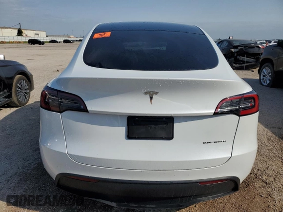 2023 Tesla Model Y Long Range with VIN 7SAYGDEE6PA053274, listed as a Copart auction lot 52865175 with Not Provided miles and Salvage Title. Bid and sale history available at DreamBid. Image 6.