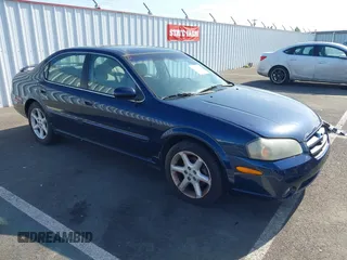 2003 Nissan Maxima SE z VIN JN1DA31D03T516575, wystawiony jako IAAI lot #42153623 z przebiegiem 176 446 mil mil oraz . Historia ofert i sprzedaży dostępna na DreamBid. Obrazek 1.