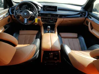 2016 BMW X6 xDrive50i with VIN 5UXKU6C5XG0R34151, listed as a Copart auction lot 44387725 with 158,088 mi miles and Clean Title. Bid and sale history available at carsss.com. Image 8.