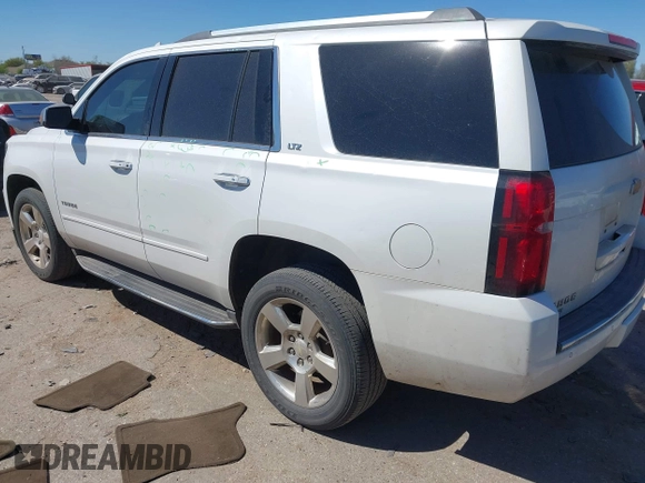 2016 Chevrolet Tahoe LTZ with VIN 1GNSCCKC1GR404754, listed as a IAAI auction lot 41831879 with 139,681 mi miles and . Bid and sale history available at DreamBid. Image 3.