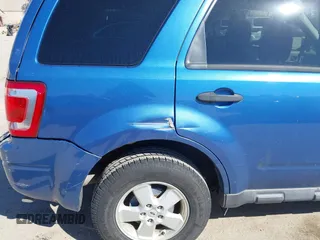 2010 Ford Escape XLT with VIN 1FMCU0D79AKB07543, listed as a IAAI auction lot 41846743 with 165,883 mi miles. Bid and sale history available at carsss.com. Image 6.