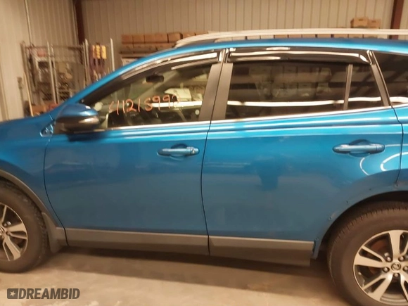 2018 Toyota RAV4 XLE with VIN JTMRFREV4JJ238654, listed as a IAAI auction lot 41215992 with 150,528 mi miles. Bid and sale history available at carsss.com. Image 15.