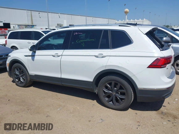 2022 Volkswagen Tiguan SE with VIN 3VV3B7AX7NM032705, listed as a IAAI auction lot 41987713 with 34,010 mi miles and . Bid and sale history available at DreamBid. Image 14.