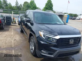 2023 Honda Ridgeline RTL-E with VIN 5FPYK3F76PB042100, listed as a IAAI auction lot 42274861 with 16,822 mi miles and . Bid and sale history available at DreamBid. Image 1.