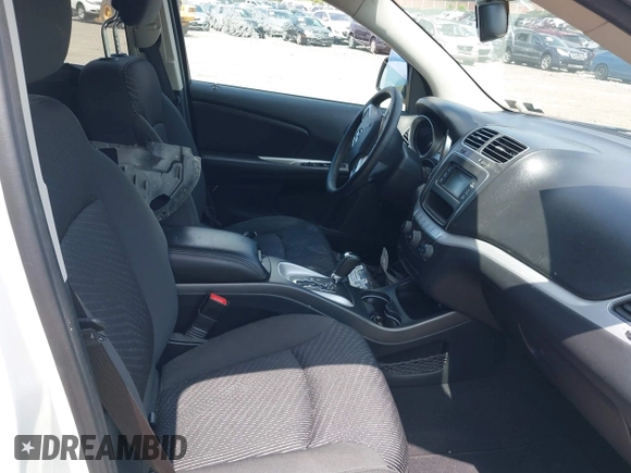 2017 Dodge Journey SXT with VIN 3C4PDDBG2HT702775, listed as a IAAI auction lot 42596303 with 130,639 mi miles and . Bid and sale history available at DreamBid. Image 5.