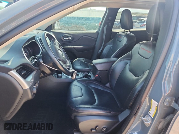 2015 Jeep Cherokee Trailhawk with VIN 1C4PJMBS4FW687328, listed as a Copart auction lot 58927765 with 119,483 mi miles and Non repairable. Bid and sale history available at DreamBid. Image 7.