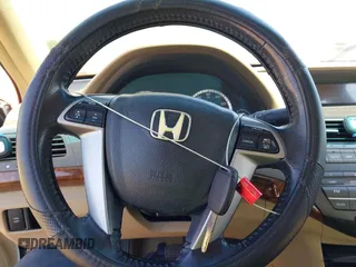 2009 Honda Accord EX-L with VIN 1HGCP36829A004440, listed as a IAAI auction lot 42041068 with 204,668 mi miles and . Bid and sale history available at DreamBid. Image 11.