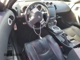 2004 Nissan 350Z Enthusiast z VIN JN1AZ36A74T015422, wystawiony jako Copart lot #77537194 z przebiegiem 147 466 mil mil oraz Nie do naprawy • Non repairable. Historia ofert i sprzedaży dostępna na DreamBid. Obrazek 8.