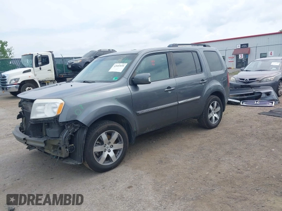 2013 Honda Pilot Touring with VIN 5FNYF3H9XDB024500, listed as a IAAI auction lot 42683695 with 151,441 mi miles and . Bid and sale history available at DreamBid. Image 18.
