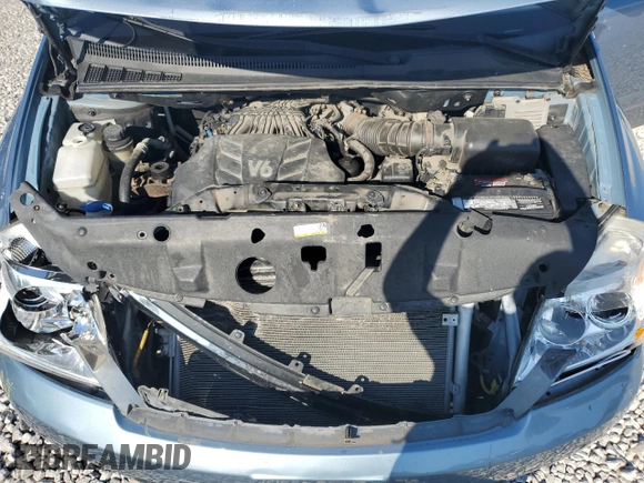 2012 Kia Sedona LX with VIN KNDMG4C70C6447748, listed as a Copart auction lot 71377294 with 146,057 mi miles and Salvage Title. Bid and sale history available at carsss.com. Image 14.