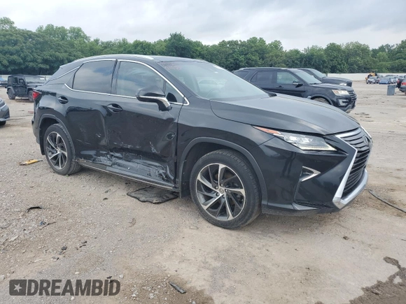 2017 Lexus RX 350 with VIN 2T2BZMCA9HC129460, listed as a Copart auction lot 57301995 with 163,128 mi miles and Salvage title. Bid and sale history available at DreamBid. Image 4.