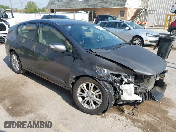 2011 Honda Insight EX with VIN JHMZE2H7XBS006254, listed as a IAAI auction lot 42222213 with 244,078 mi miles and . Bid and sale history available at DreamBid. Image 1.