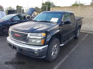 2010 GMC Canyon z VIN 1GTJSFDP6A8134412, wystawiony jako IAAI lot #41589150 z przebiegiem 164 232 mil mil oraz . Historia ofert i sprzedaży dostępna na DreamBid. Obrazek 2.