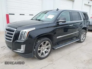 2018 Cadillac Escalade Premium Luxury z VIN 1GYS4CKJ1JR279129, wystawiony jako IAAI lot #42183231 z przebiegiem 130 086 mil mil oraz . Historia ofert i sprzedaży dostępna na DreamBid. Obrazek 2.