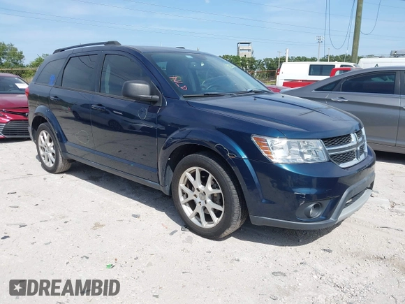 2014 Dodge Journey SXT with VIN 3C4PDCBG3ET218328, listed as a IAAI auction lot 42086656 with 55,620 mi miles. Bid and sale history available at carsss.com. Image 1.